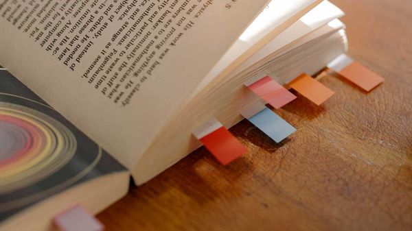 A book with many bookmarks